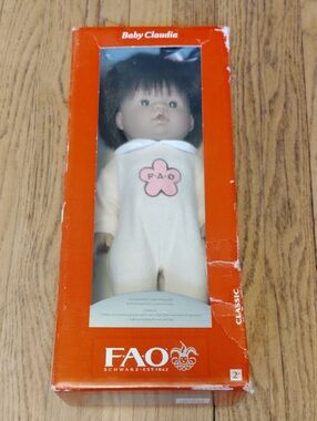 FAO Schwarz Baby Claudia Doll with Pink Flower Outfit